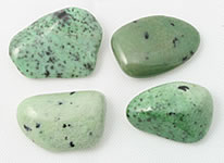 Green stone with deals black veins