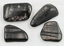 Shiny black stone on sale with white bands