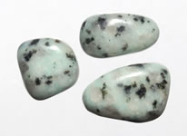 Green stone with black on sale spots