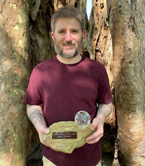 Adam Rittenhouse with rock tumbling trophy
