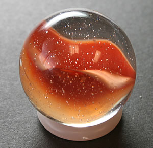 Air bubbles in a glass marble